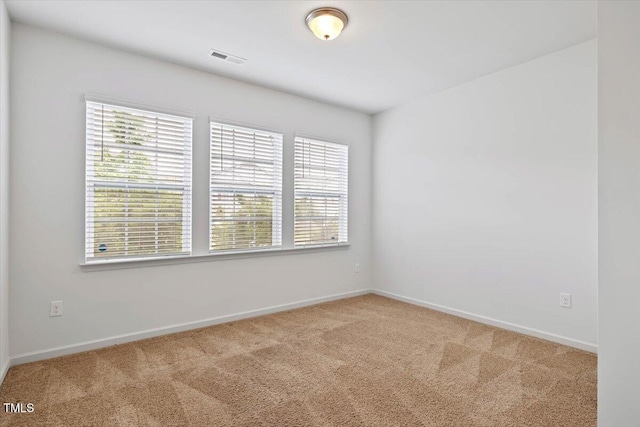 346 E Painted Way, Clayton, NC 27527 - spare room with carpet and baseboards