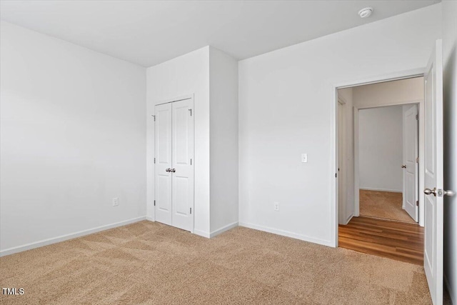 346 E Painted Way, Clayton, NC 27527 - unfurnished bedroom featuring carpet flooring and a closet