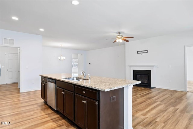 346 E Painted Way, Clayton, NC 27527 - kitchen with ceiling fan, stainless steel dishwasher, light wood-type flooring, dark brown cabinetry, and recessed lighting