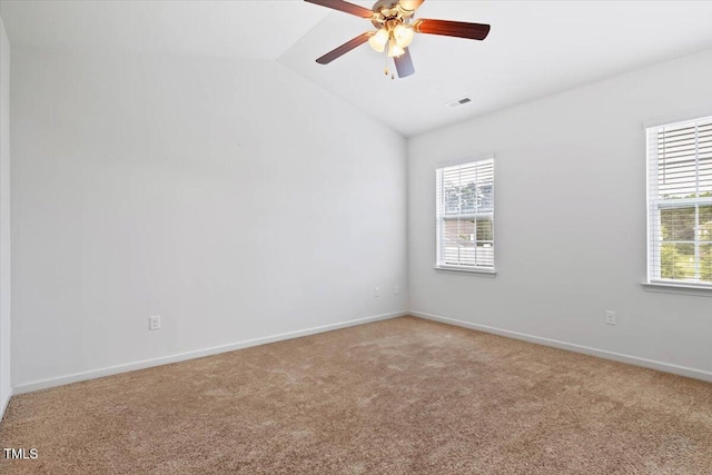 346 E Painted Way, Clayton, NC 27527 - empty room featuring plenty of natural light, vaulted ceiling, light carpet, and a ceiling fan