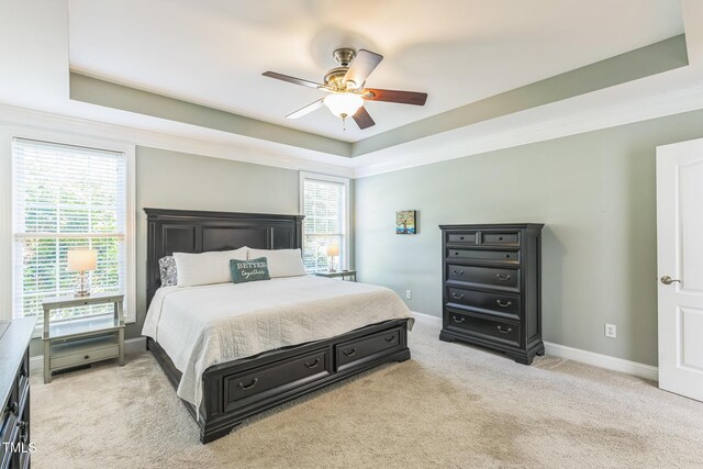30155 Pharr, Chapel Hill, NC 27517 - bedroom with a tray ceiling, light carpet, baseboards, and ceiling fan