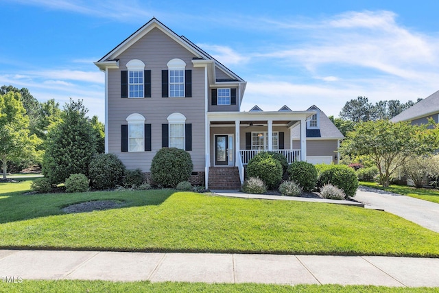 30155 Pharr, Chapel Hill, NC 27517 - view of front facade featuring a porch and a front lawn