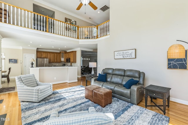 30155 Pharr, Chapel Hill, NC 27517 - living area with ornamental molding, ceiling fan, baseboards, light wood-style floors, and recessed lighting