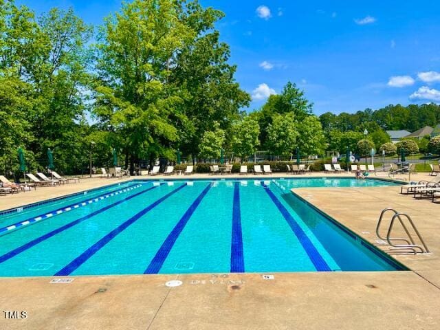 30155 Pharr, Chapel Hill, NC 27517 - community pool featuring a patio and view of wooded area