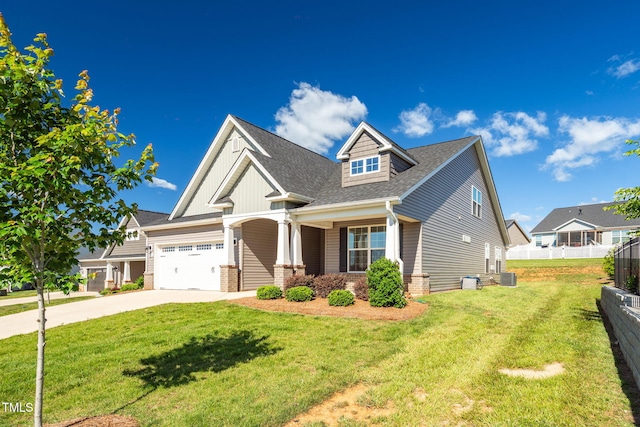 1085 Lobdale Ct, Burlington, NC 27215 - craftsman house with a shingled roof, concrete driveway, an attached garage, central AC, and brick siding