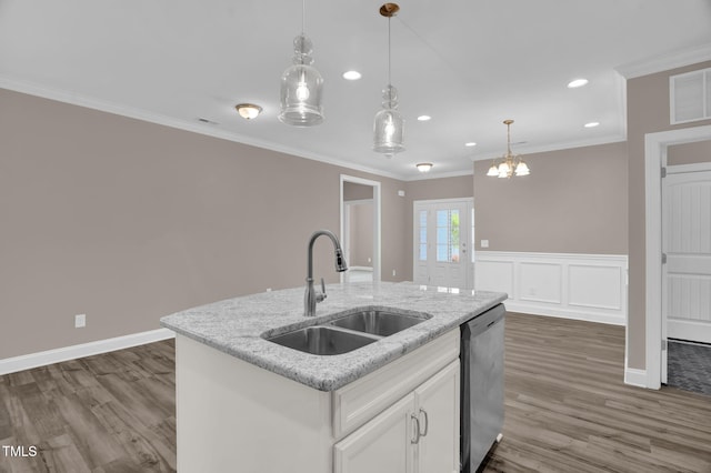 1085 Lobdale Ct, Burlington, NC 27215 - kitchen with a sink, dishwasher, dark wood finished floors, hanging light fixtures, and white cabinetry