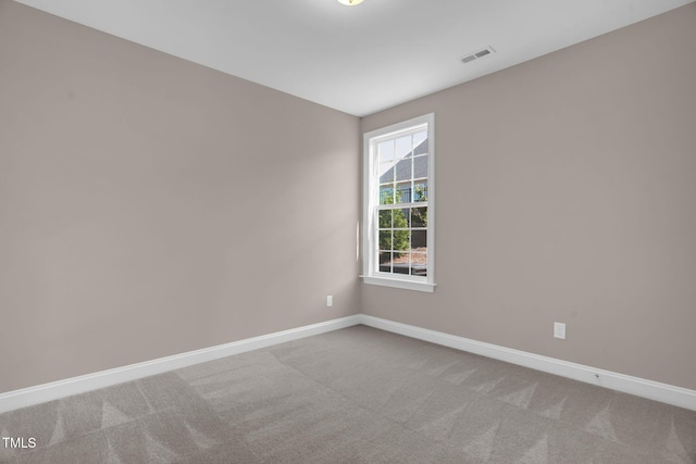 1085 Lobdale Ct, Burlington, NC 27215 - carpeted empty room with baseboards