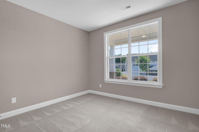 1085 Lobdale Ct, Burlington, NC 27215 - unfurnished room with baseboards and light carpet