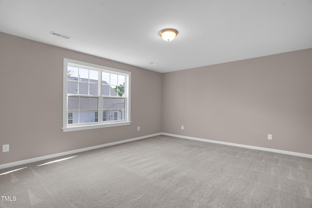 1085 Lobdale Ct, Burlington, NC 27215 - empty room with baseboards and carpet floors