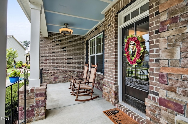 2100 Della Ct, Apex, NC 27502 - view of exterior entry with a porch and brick siding