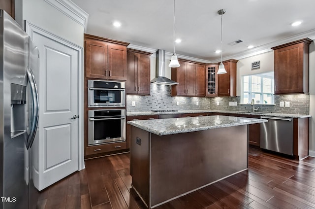 2100 Della Ct, Apex, NC 27502 - kitchen featuring stainless steel appliances, wall chimney exhaust hood, a sink, dark wood-style floors, and glass insert cabinets
