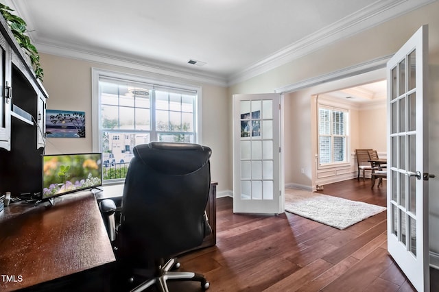 2100 Della Ct, Apex, NC 27502 - home office featuring french doors, wood finished floors, healthy amount of natural light, crown molding, and baseboards