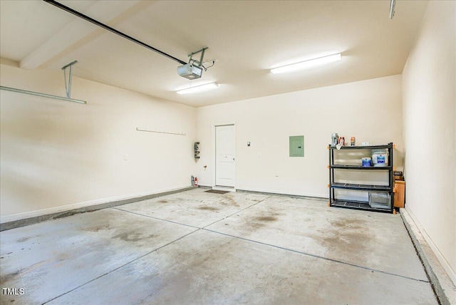145 Torrey Heights Ln, Durham, NC 27703 - garage featuring electric panel and a garage door opener
