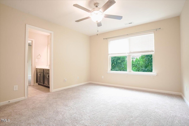 145 Torrey Heights Ln, Durham, NC 27703 - unfurnished room featuring light colored carpet, ceiling fan, and baseboards