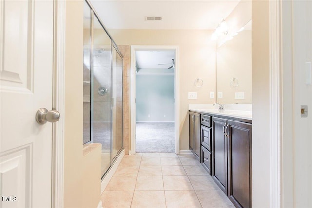 145 Torrey Heights Ln, Durham, NC 27703 - bathroom featuring vanity, a shower stall, and tile patterned flooring