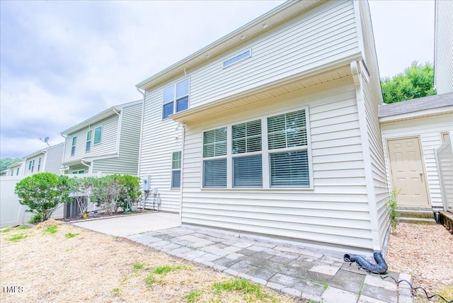 145 Torrey Heights Ln, Durham, NC 27703 - back of house with a patio area