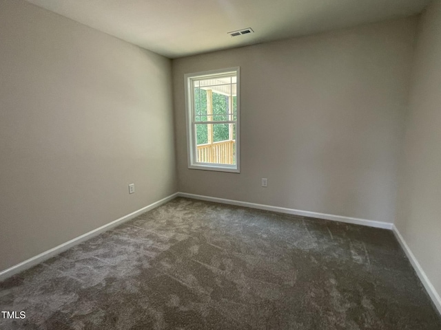 226 Bonsai Way, Four Oaks, NC 27524 - spare room featuring dark colored carpet
