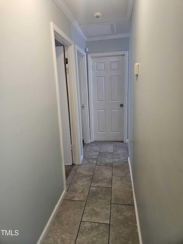 118 Lynn Rd, Durham, NC 27703 - corridor featuring attic access, baseboards, ornamental molding, and tile patterned flooring