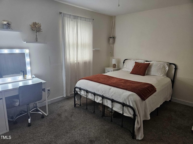 118 Lynn Rd, Durham, NC 27703 - carpeted bedroom featuring an office area and baseboards