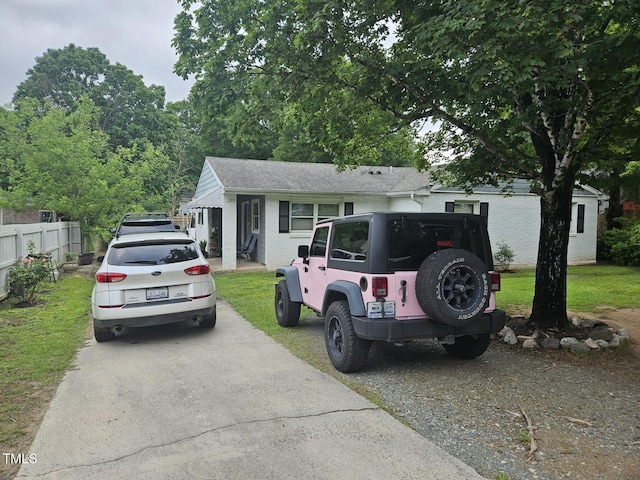 118 Lynn Rd, Durham, NC 27703 - view of front of property with driveway and a shingled roof