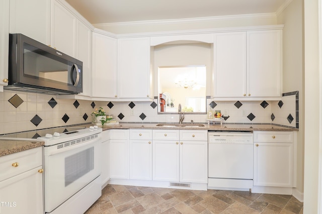 128 Olde Manor Ct, Siler City, NC 27344 - kitchen featuring white appliances, a sink, white cabinets, light stone countertops, and crown molding