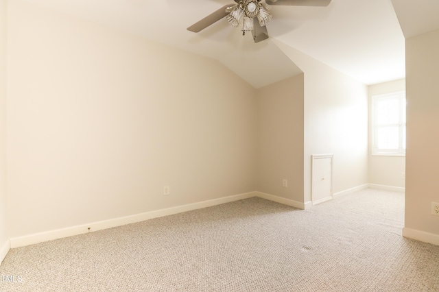 128 Olde Manor Ct, Siler City, NC 27344 - additional living space with light colored carpet, a ceiling fan, baseboards, and vaulted ceiling