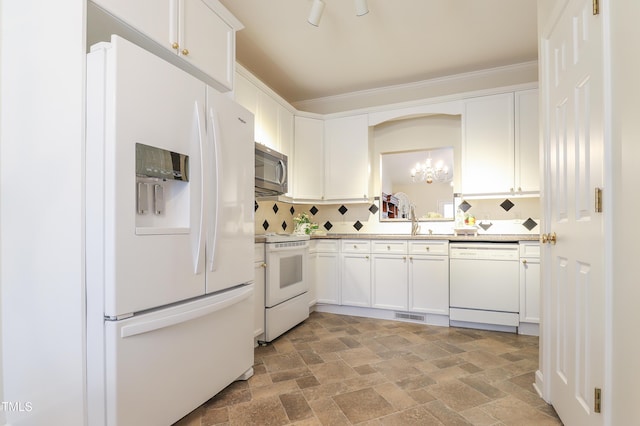 128 Olde Manor Ct, Siler City, NC 27344 - kitchen featuring white appliances, light stone finish flooring, a sink, and backsplash