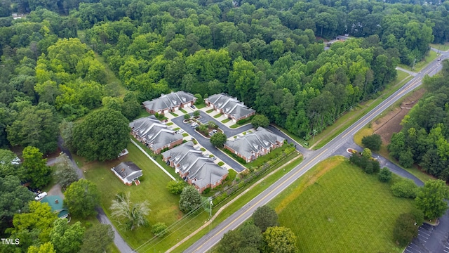 128 Olde Manor Ct, Siler City, NC 27344 - aerial view of property's location with a heavily wooded area