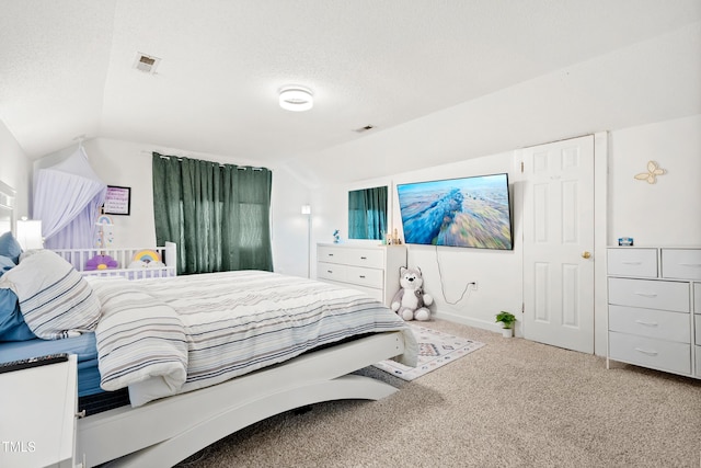 4705 Royal Troon Dr, Raleigh, NC 27604 - bedroom with carpet, vaulted ceiling, a textured ceiling, and baseboards