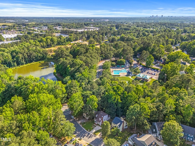 4705 Royal Troon Dr, Raleigh, NC 27604 - aerial overview of property's location featuring a nearby body of water, a pool area, and a forest