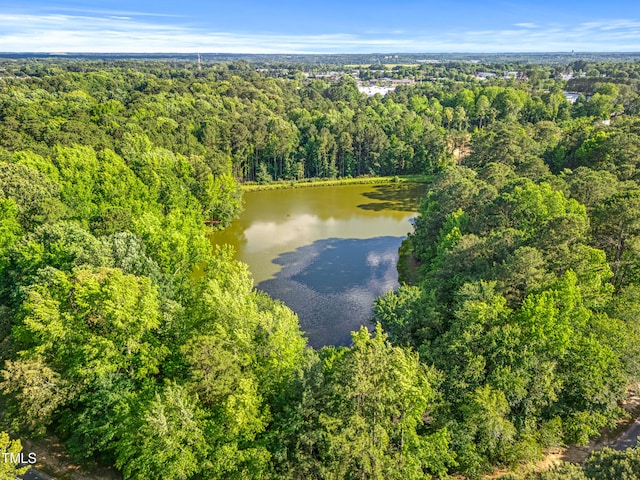 4705 Royal Troon Dr, Raleigh, NC 27604 - drone / aerial view of a heavily wooded area and a large body of water