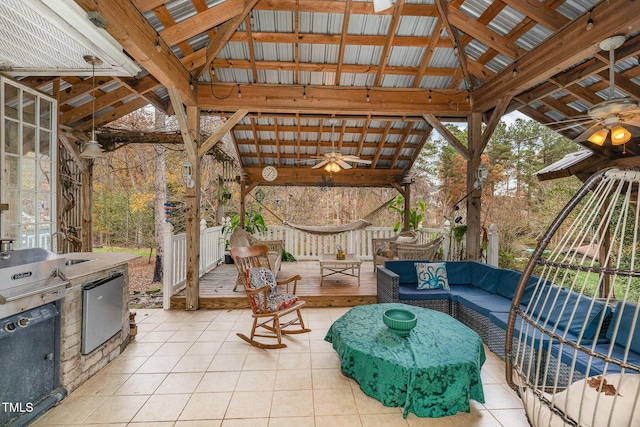 103 Pony Express Cv, Louisburg, NC 27549 - view of patio with a ceiling fan, a wooden deck, an outdoor living space, and a gazebo
