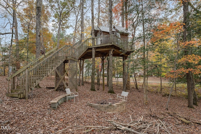 103 Pony Express Cv, Louisburg, NC 27549 - view of yard with stairs, a deck, and an outdoor fire pit