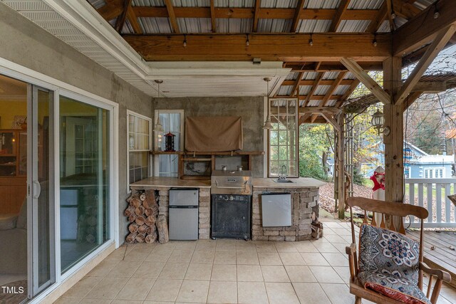 103 Pony Express Cv, Louisburg, NC 27549 - view of patio / terrace featuring area for grilling and a sink