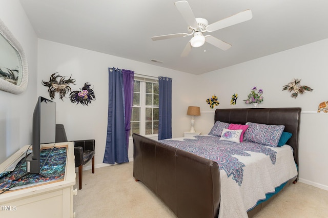 103 Pony Express Cv, Louisburg, NC 27549 - bedroom featuring light carpet, baseboards, and a ceiling fan