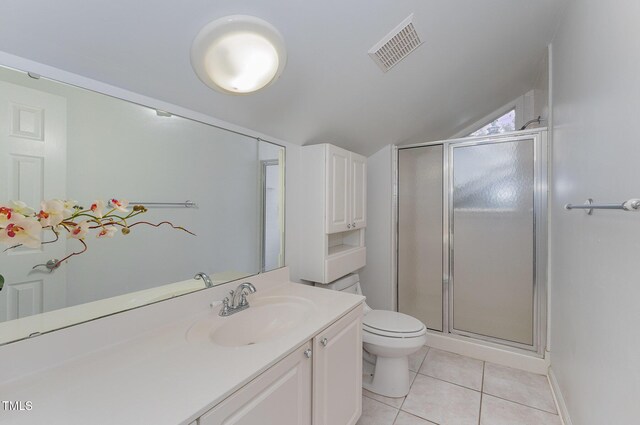 103 Pony Express Cv, Louisburg, NC 27549 - full bathroom featuring toilet, vanity, tile patterned floors, a stall shower, and lofted ceiling