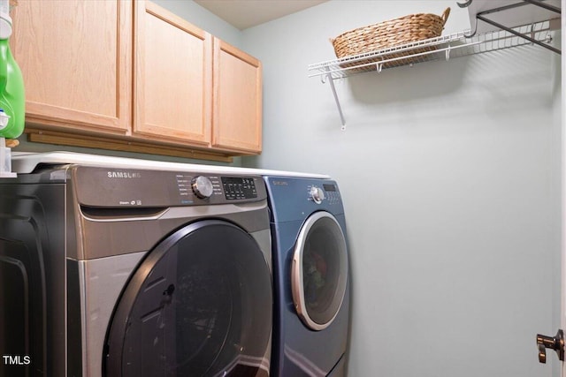 947 Middle Ground Ave, Rolesville, NC 27571 - laundry area featuring separate washer and dryer and cabinet space