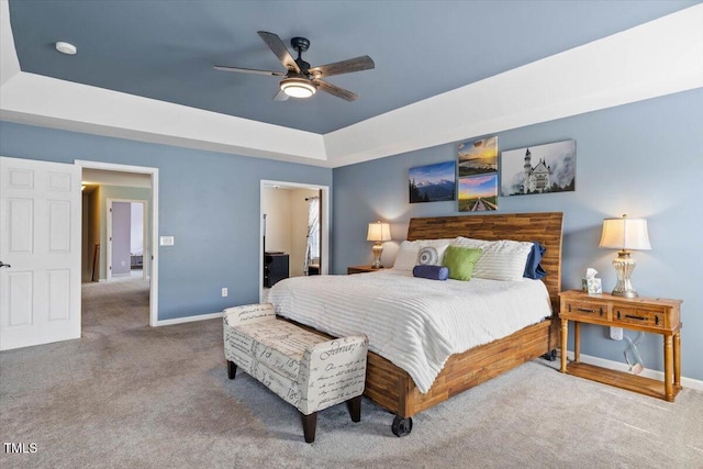 947 Middle Ground Ave, Rolesville, NC 27571 - bedroom with a raised ceiling, baseboards, and carpet