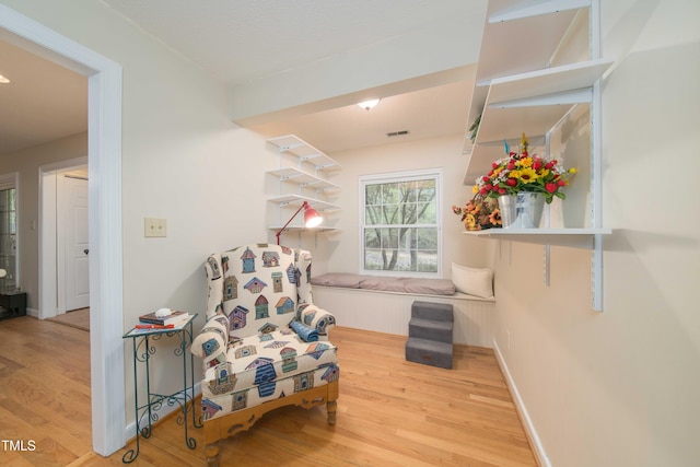 4710 Rollingwood Dr, Durham, NC 27713 - sitting room with wood finished floors and baseboards