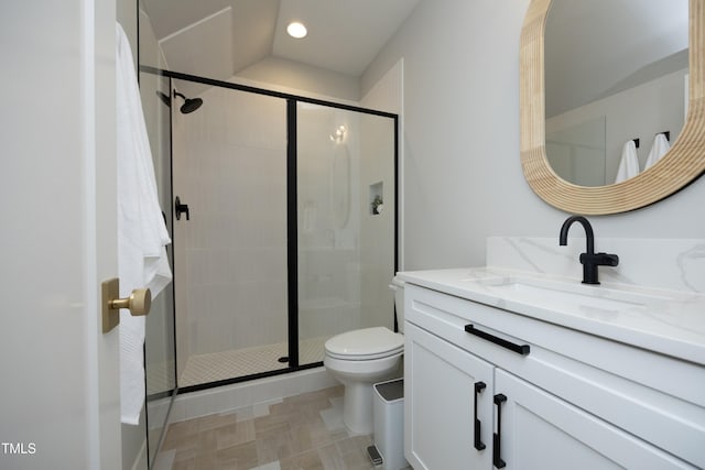 7736 Roberts Rd, Apex, NC 27523 - bathroom featuring toilet, vanity, a shower stall, and recessed lighting
