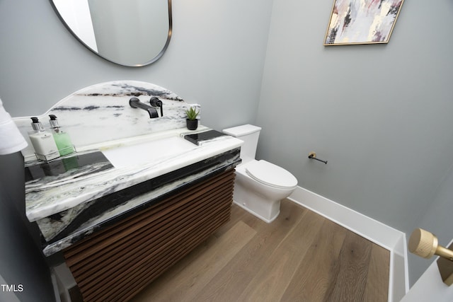 7736 Roberts Rd, Apex, NC 27523 - bathroom with wood finished floors, toilet, a tanning bed, and vanity