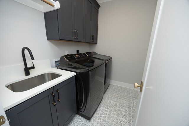 7736 Roberts Rd, Apex, NC 27523 - laundry room featuring cabinet space, washer and clothes dryer, and baseboards