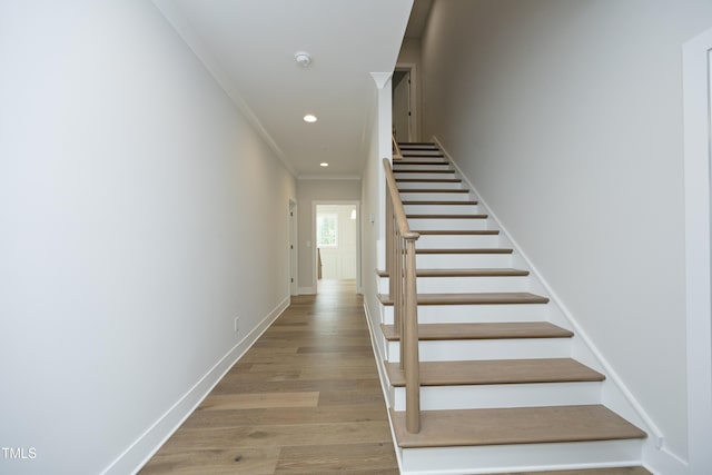 7736 Roberts Rd, Apex, NC 27523 - staircase featuring recessed lighting, baseboards, ornamental molding, and wood finished floors