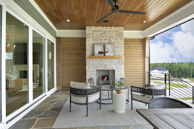 7736 Roberts Rd, Apex, NC 27523 - sunroom featuring ceiling fan and an outdoor living space with a fireplace