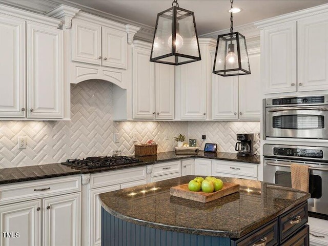 2207 Cameron Pond Dr, Cary, NC 27519 - kitchen featuring black gas stovetop, white cabinetry, stainless steel double oven, and dark stone countertops