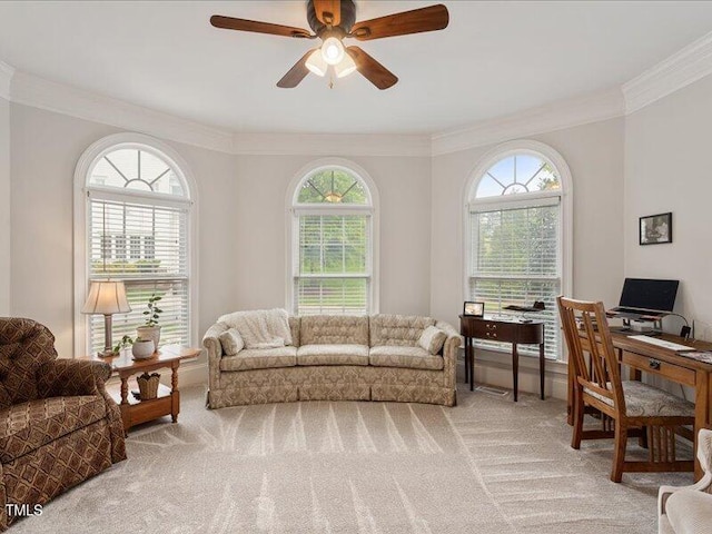 2207 Cameron Pond Dr, Cary, NC 27519 - living area featuring light colored carpet, ornamental molding, ceiling fan, and a desk