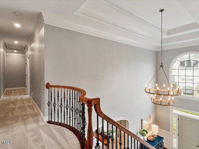 2207 Cameron Pond Dr, Cary, NC 27519 - corridor featuring an upstairs landing, crown molding, a chandelier, light carpet, and baseboards