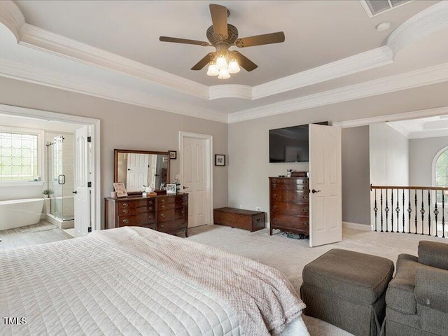 2207 Cameron Pond Dr, Cary, NC 27519 - bedroom with a tray ceiling, ornamental molding, light carpet, baseboards, and ceiling fan