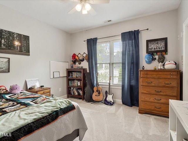 2207 Cameron Pond Dr, Cary, NC 27519 - bedroom with baseboards, light colored carpet, and ceiling fan