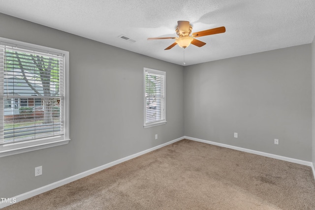 4658 Fawnbrook Cir, Raleigh, NC 27612 - carpeted empty room featuring ceiling fan, a textured ceiling, and baseboards